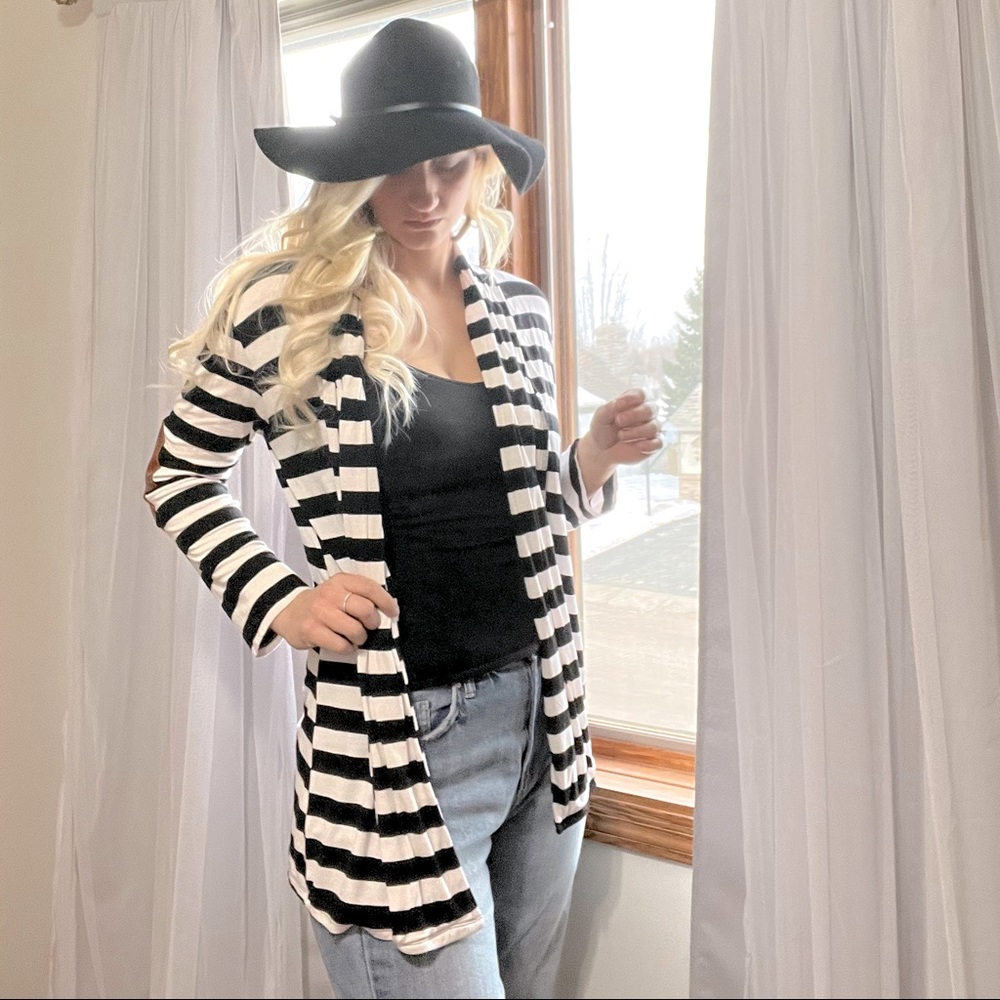 Black and white striped cardigan with brown elbow patches